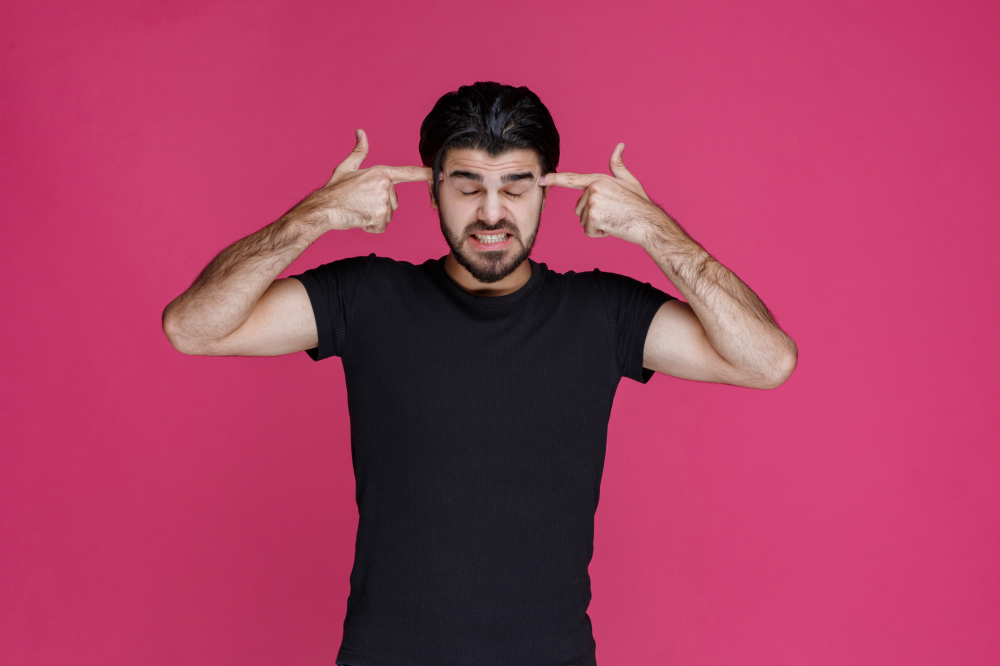 Honeyview man pointing his head and overthinking about something trying to remember 1